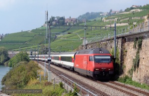 The regular Genève-Aéroport - Brig IR trains were all hauled by class 460s on conventional stock. 460.010 approached St-Saphorin with eastbound IR1429 on 5 September 2012.