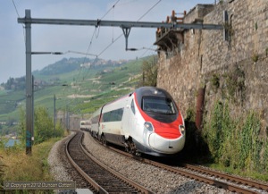 An ETR610 tilting EMU passed St-Saphorin with EC39, the 13:42 Genève to Milano Centrale, on 5 September 2012. Despite carrying SBB livery and markings, these units are classified under the Italian system and presumably carry Italian numbers.