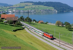 11148 made a fine sight hauling IR2423, the 14:40 Luzern - Romanshorn Voralpen Express, photographed south of Immensee on 9 September 2012. Like many Swiss lines, the Immensee to Arth-Goldau section is signalled for bi-directional working and an unusually high proportion of trains seemed to run 