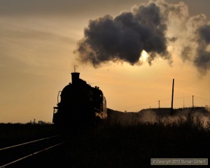 SY.0770 restarted a train of spoil empties from the bothy on Wulong Tip on 9 November.