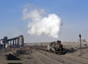 It's taken five trips to Sandaoling to get this shot of a train leaving Beiquan Yijing. For once, the sun stayed out and the wind behaved itself. JS.8358 pulled away from the mine at lunchtime on 20 November.